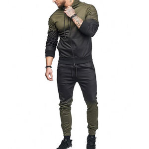 เสื้อแจ็คเก็ตกันลมมีฮู้ดลายนูนโลโก้หรูหรากางเกงกันลมกันน้ำแจ็คเก็ตกันลมมีฮู้ดกางเกงปก - Product Image 1