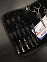 Le kit professionnel d'outils d'extensions de cheveux noirs mats comprend une séparation en boucle et une pince à deux trous pour les cheveux à double trame Remy Machine