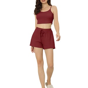 Ensemble de vêtements de sport en coton pour femmes, style été, soutien-gorge de sport et short de jogging, coupe décontractée avec étiquette personnalisée, vente en gros, motif uni, tenue de détente - Product Image 1