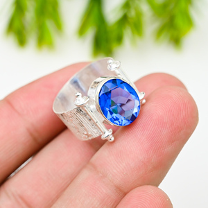 แหวนรูปไข่บุษราคัมสีฟ้าหรูหราขนาด10X14มม. อัญมณีชุบเงินแท้การตั้งค่า IGI ได้รับการรับรองเราขนาด - Product Image 2