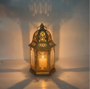 Premium Gold Metal <b>Moroccan</b> <b>Lantern</b> with Intricate Cutwork Glass Panels Warm Candle Glow for Elegant Home Decor and Gifting - Product Image 5