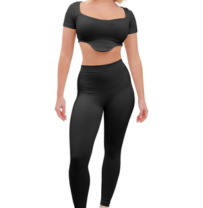 Mallas de cintura alta acanaladas para mujer, Top corto, chándal elástico sin costuras, conjunto de gimnasio sin costuras en stock, ropa deportiva transpirable OEM - Product Image 1