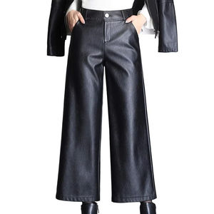 Pantalones de cuero PU de cintura alta y pierna ancha para mujer, estilo casual de color liso con botones frontales y ajuste holgado hasta el tobillo - Product Image 1