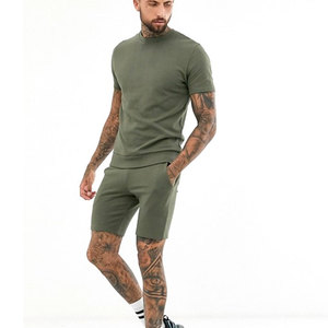 ชุดออกกำลังกายแขนสั้นสำหรับผู้ชายเสื้อยืดโอเวอร์ไซส์ลายสีทึบชุดใส่ไปทะเลแบบกางเกงขาสั้นผ้าย้อมสีเรียบ - Product Image 3