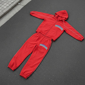 Chándal de jogging holgado de nailon de 100% poliéster de la mejor calidad, chaqueta con cremallera para hombre y pantalones holgados con puños, conjunto cortavientos de Color sólido - Product Image 4