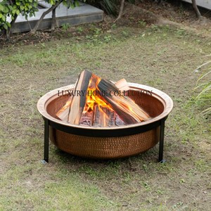 Outdoor decorative metal <b>fire</b> <b>pit</b> with intricate cutout designs for mesmerizing <b>fire</b> glow and stylish backyard ambiance - Product Image 6