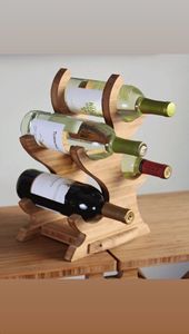 Porte-bouteille en bois artisanal conçu pour le rangement et l'exposition élégants de bouteilles de vin, d'eau ou décoratives - Product Image 5