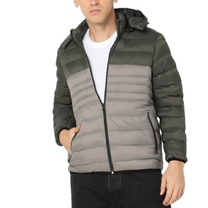 Veste matelassée pour homme, exportation commerciale, conçue pour l'approvisionnement en gros en hiver, avec rembourrage isolant et performance de résistance durable - Product Image 1