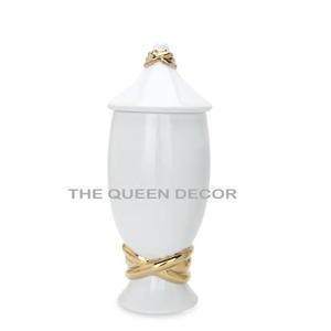 Pot de rangement en aluminium de qualité supérieure, forme ronde, finition or et noir, avec couvercles ouverts - Product Image 5