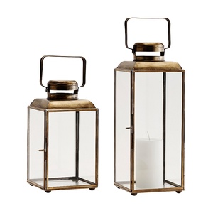 Lanterne à bougie en métal et en verre de conception tendance du marché en gros Nouveau design Lanterne à bougie en métal et en verre faite à la main - Product Image 1