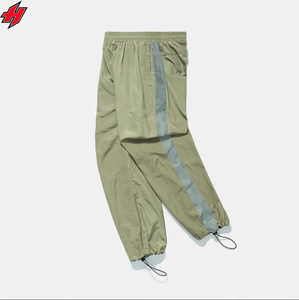 Pantalones de chándal de nailon personalizados 100% poliéster pantalones de nailon de pierna ancha logotipo bordado 3D pantalones de chándal de nailon holgados para hombres - Product Image 5