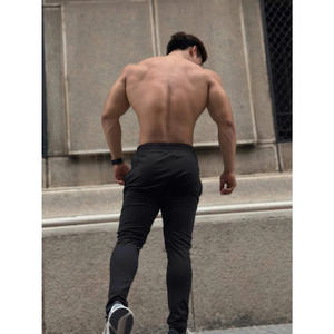 SP05, pantalones ligeros de algodón para correr, absorbe el sudor rápido con sensación suave para una movilidad cómoda y deportiva, disponible en negro y blanco - Product Image 5