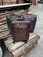 Valise en cuir pleine fleur 2026 avec roues pivotantes à 360 degrés, chariot de voyage classique unisexe, fermeture éclair durable, poignée souple