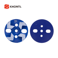 Disques abrasifs diamantés à quatre segments de flèche de 4 pouces Disques abrasifs personnalisés OEM pour béton Terrazzo avec axe