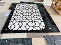 Mosaïque de marbre noir et blanc à motifs floraux en pierre naturelle, design personnalisé, jet d'eau irrégulier