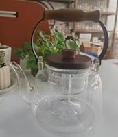 Théière en verre borosilicaté gris fumée transparente résistante un pot de faisceau de levage en verre