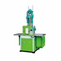 Machine de moulage par injection verticale à disque bicolore, un moule supérieur et deux moules inférieurs, écran tactile PLC intelligent, haute précision