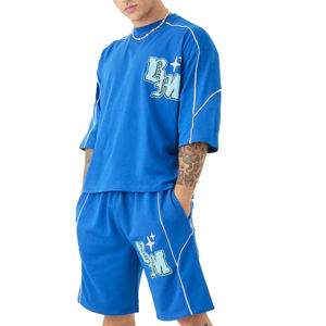 ชุดกีฬาสองชิ้นสำหรับผู้ชายฤดูร้อนเสื้อยืดแขนสั้นอินเทรนด์กางเกงขาสั้นลำลองทรงหลวมถักแบบหล่อ - Product Image 1
