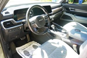 Verde Usado 2024 Kia Telluride SX-X-Pro AWD Con Ruedas de Aleación Asientos de Cuero Sistema de Navegación Tercera Fila Asientos Arranque Remoto - Product Image 4