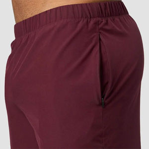 กางเกงออกกำลังกายวิ่งน้ำหนักเบาสำหรับผู้ชายกางเกงขาสั้นสำหรับใส่ออกกำลังกายแห้งเร็วสีแดงเข้มเป็นมิตรกับสิ่งแวดล้อม - Product Image 6