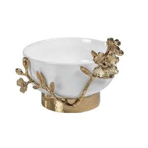 A modern decorative metal bowl featuring a polished silver finished and an elegant floral branch accent along the rim - Product Image 3