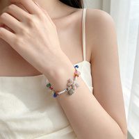 Ensemble collier et bracelet en perles de verre artisanales Boho Dopamine, bijoux colorés avec breloques papillon et feuille, cadeau pour femmes