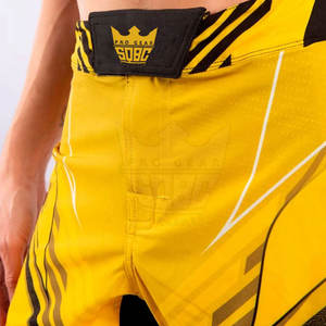 กางเกง MMA สำหรับผู้ชาย ผลิตในปากีสถาน รับทำโลโก้ตามสั่ง แห้งเร็ว น้ำหนักเบา ระบายอากาศได้ดี คุณภาพสูง สีตัดกัน บริการ OEM - Product Image 5