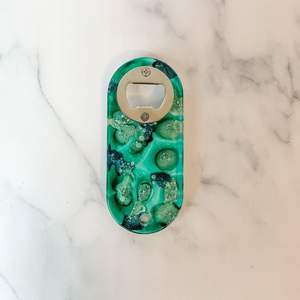 Resin and metal bottle opener featuring hand painted accents and traditional shape for classic home or bar decor - Product Image 4