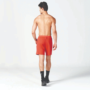 Pantalones cortos flexibles acanalados de tela de rendimiento ligero naranja con cintura de tela acanalada y dobladillo con puños - Product Image 3