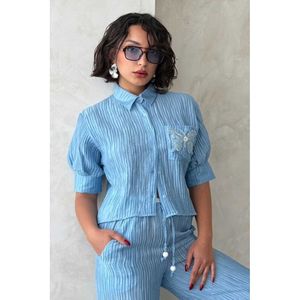 Blusa Elegante Plisada Color Crema con Detalle de Mariposa para Mujer, Marca TOPSHOW - Camisa de Manga Larga con Estilo para Venta al Por Mayor - Product Image 5