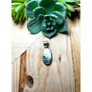 Navajo Handmade Sterling Silver Pendant with White Buffalo Bezel Setting Inlay - Product Image 1