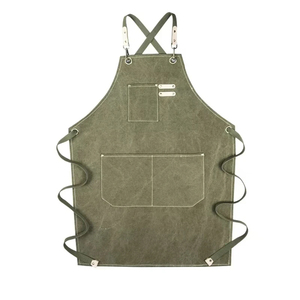 Tablier de cuisine classique sans manches en toile robuste verte avec taille ajustable et poches, lavable pour usage quotidien - Product Image 1