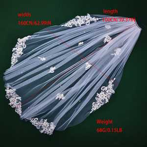 Peigne à cheveux Bridella M33-W en dentelle et tulle ivoire, confortable et sécurisé, décoration de cheveux élégante pour mariages, bals et événements formels - Product Image 2