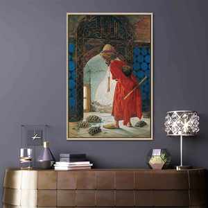 Toile imprimée : reproduction de « The Tortoise Trainer » d'Osman Hamdi, encadrée en or - Product Image 1