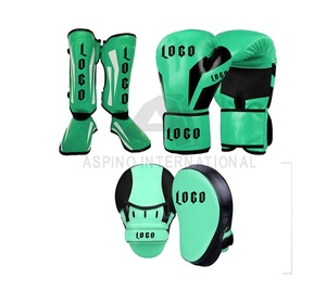 Compre guantes de boxeo personalizados con logotipo personalizado Guantes de boxeo de repuesto de entrenamiento de cuero de vaca dorado Juego de espinilleras con almohadilla de enfoque - Product Image 4