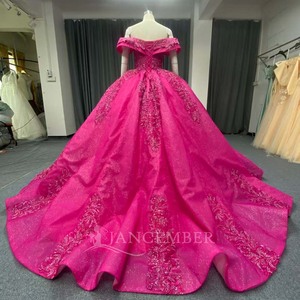 ANY269 Hermoso Vestido de Quinceañera Color Fucsia con Lentejuelas y Hombros Descubiertos - Product Image 2