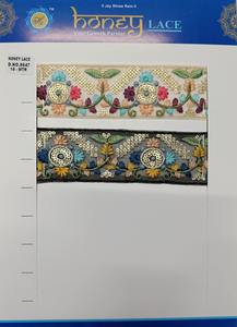 Tela de encaje bordado floral colorida vibrante y detallada con patrones intrincados, perfecta para la moda de alta gama - Product Image 2