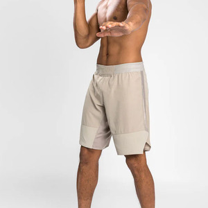 กางเกงขาสั้นผ้าดีผิวสีล้วนของผู้ชายทรงหลวมดีไซน์ใหม่คุณภาพสูง - Product Image 1