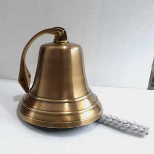 Campana Náutica Vintage de Latón para Montaje en Pared, Agrega un Aspecto Auténtico de Océano a Cualquier Habitación o Espacio - Product Image 1