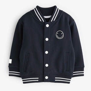 Veste universitaire unisexe bleu marine avec broderie sourire, en coton tricoté, style preppy, coupe classique, pour l'automne - Product Image 1