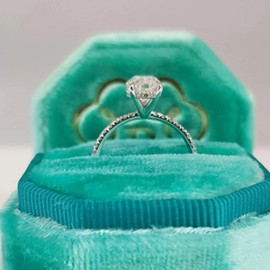 Elegant Oval Cut Moissanite Diamond Solitaire Proposal <b>Ring</b> with Invisible Halo <b>Set</b> in <b>Silver</b> and Delicate Half Eternity Band - Product Image 3