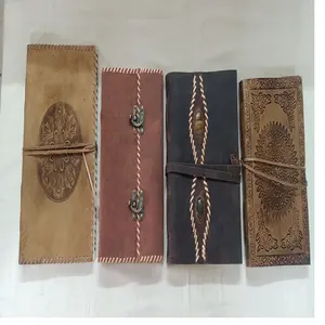 Custom made embossed leather journals in assorted sizes and patterns suitable for resale ideal for art and craft stores