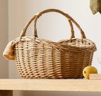 Panier en rotin élégant et personnalisable, respectueux de l'environnement, avec poignées en cuir, pour des solutions de rangement modernes à la maison