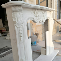 Hochwertiger Wandmontierter Ethanol-Marmor-Kamin Designer Handgeschnitzter Art Deco Naturstein-Umrandung Luxuriöse Ausführung Fabrikfertigung