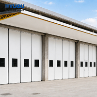 Puerta Industrial Plegable Automática de Acero Resistente con Panel Sándwich Aislante, Impermeable y Ahorro Energético