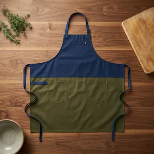 Tablier classique en toile bleu marine et vert bicolore avec poches, lavable en machine, réutilisable, durable, résistant à l'eau pour la cuisine et l'usage quotidien - Product Image 1
