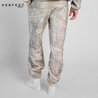 Joggers personnalisés de haute qualité avec imprimé camouflage pour unisexe Baskets streetwear grande taille avec cordon de serrage teints en plaine