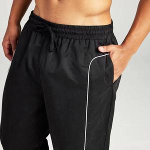 Dernier design de luxe Pantalon de survêtement en nylon à jambe droite pour hommes Pantalon de sport large et large imperméable avec passepoil - Product Image 4