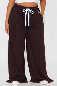 Pantalon de jogging ample à cordon de serrage pour femme, haute qualité, poches latérales, 100 % coton, coupe-vent et respirant, vente en gros - Product Image 2