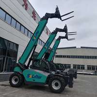 Chariot télescopique robuste avec fourche à palettes et attache rapide pour travaux de chargement en agriculture et construction